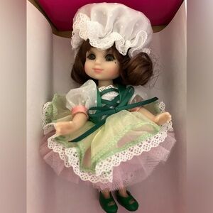 Gently used in original box Marie Osmond March Calendar Girl Doll 6 inch